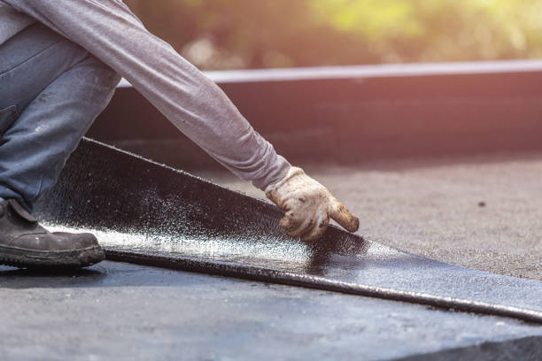 Professional Waterproofing technician working in Lexington, TN